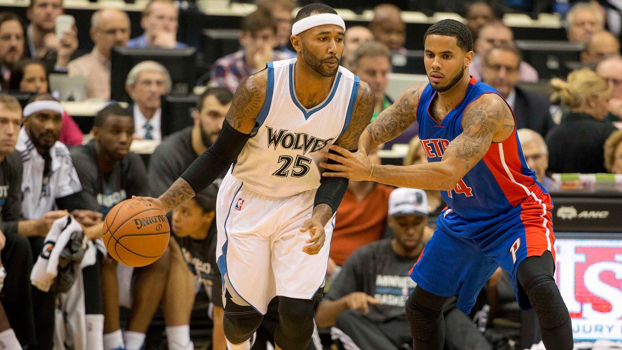 Amid excitement of home opener, veterans lift new-look Wolves to win